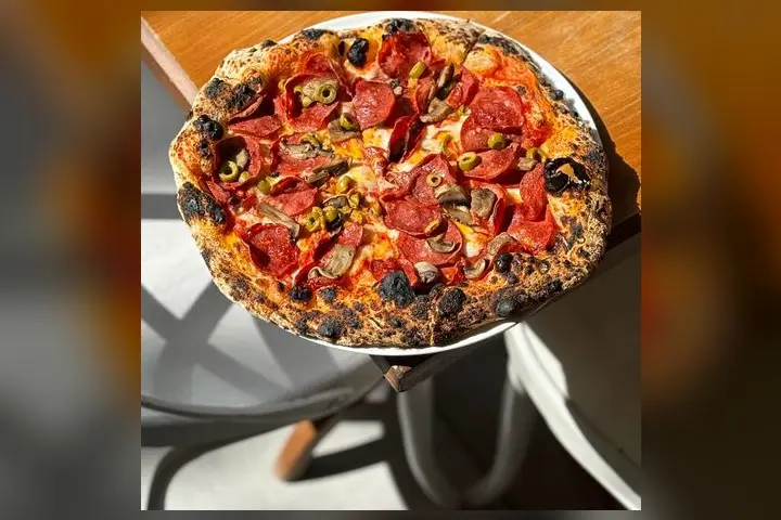 A pepperoni pizza fresh from the oven